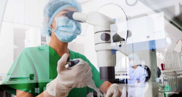 Scientist using equipment in laboratory